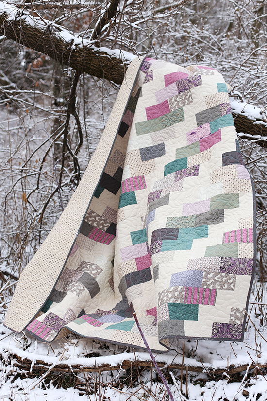 Grandma's Quilt made by Anna Graham using the Side Braid quilt pattern and quilted by Christina Lane