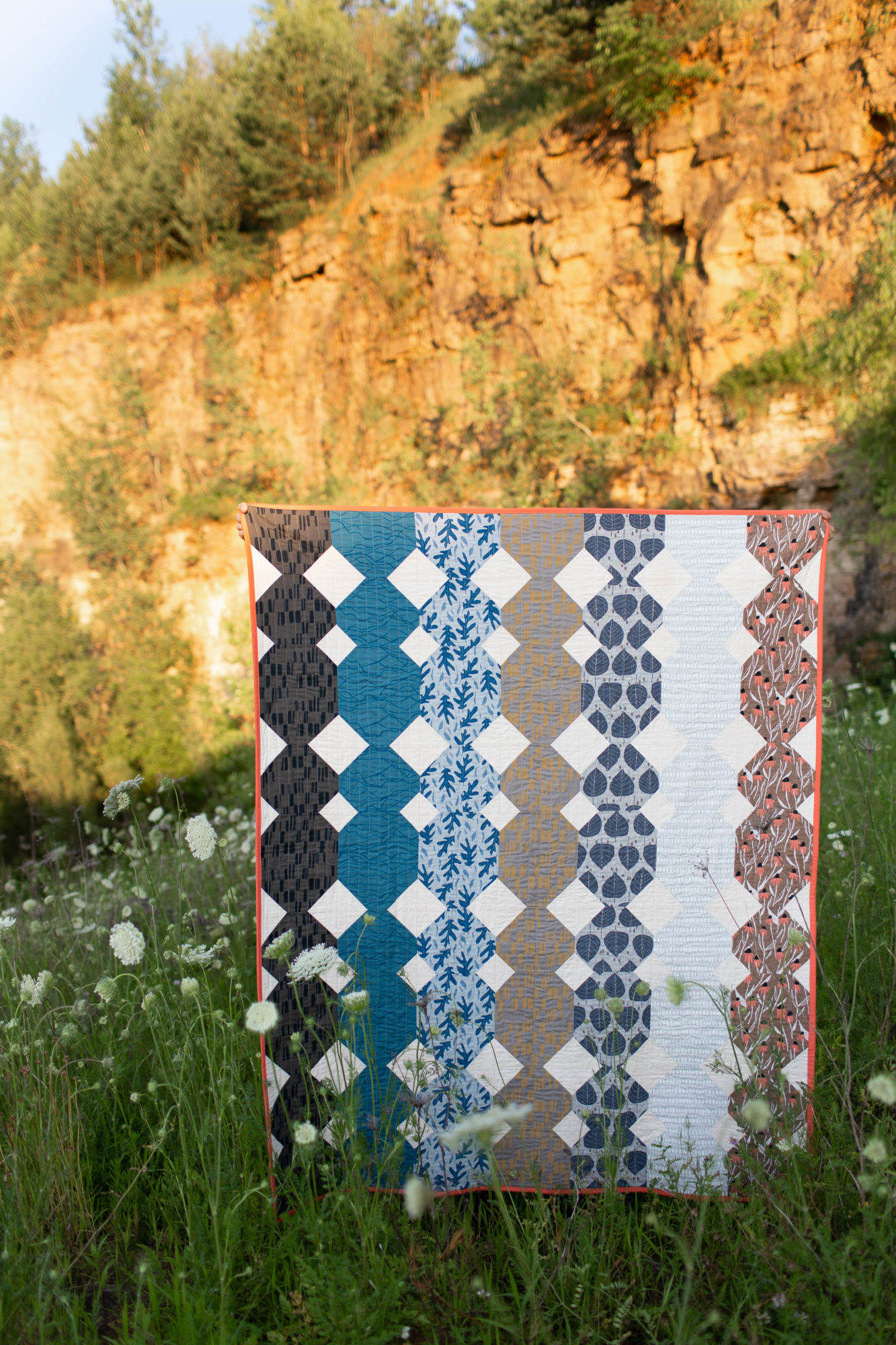 Paper Cuts quilt featuring Quarry Trail